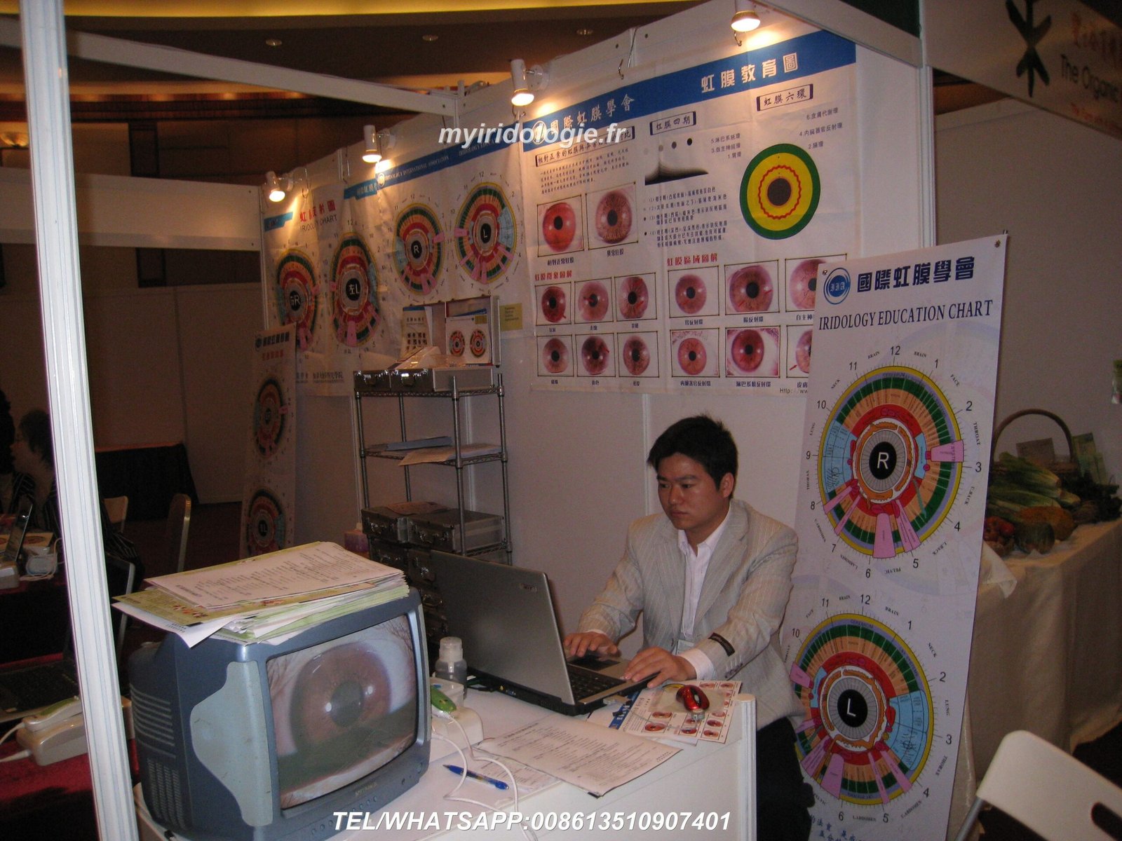 Quality control technician testing iridology camera image resolution