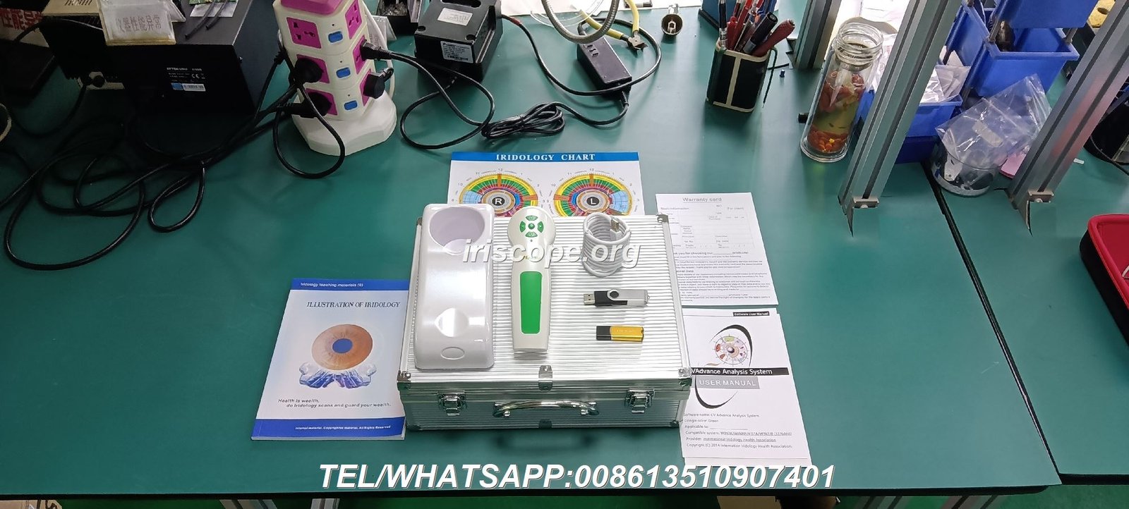 Nutrition counselor using iridology camera during consultation